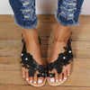 Close-up view of Women's Bohemian Flat Sandals with lace and pearl details