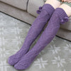 Thigh-high Sline Pom Pom Winter Long Knitted Socks perfect for layering, fashion, and warmth.